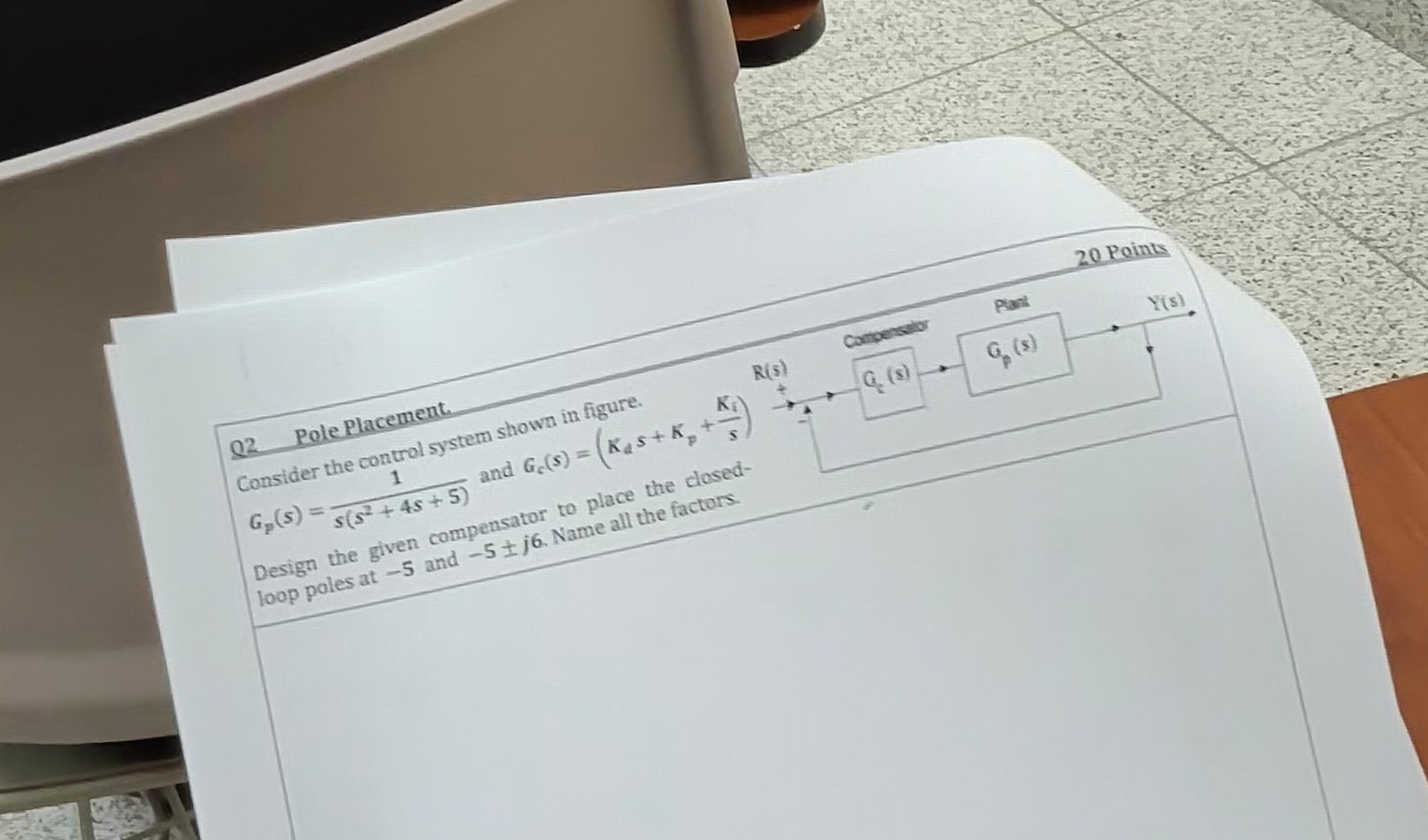 Q 2 Pole placement. Consider the control system