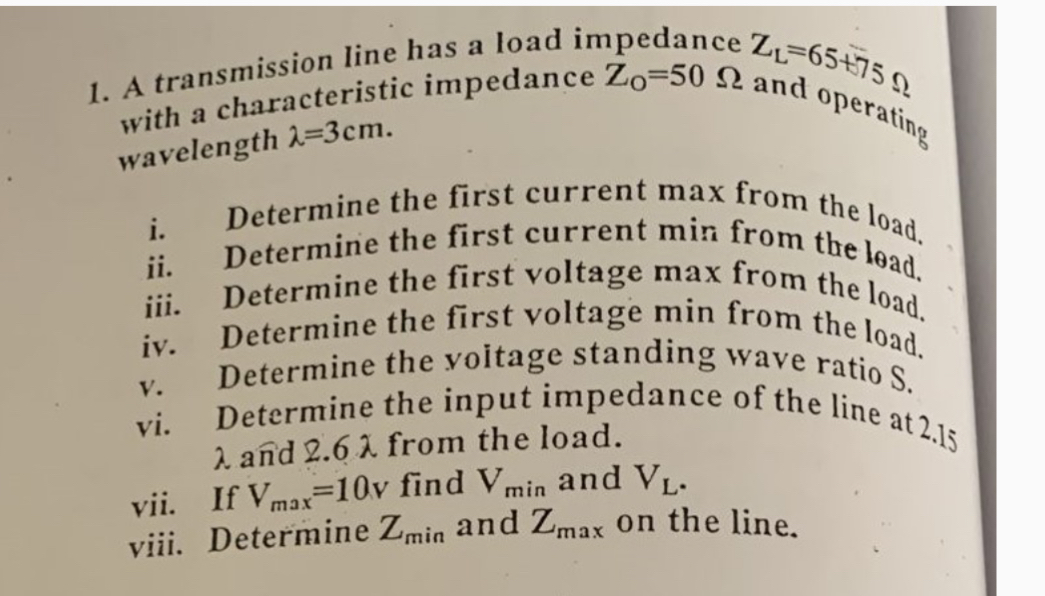 A transmission line has a load impedance Z L = 6