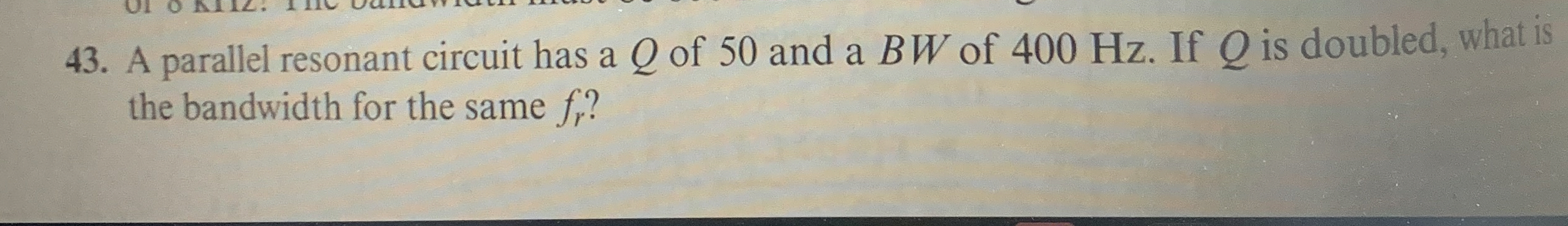 A parallel resonant circuit has a Q of 5 0 and a