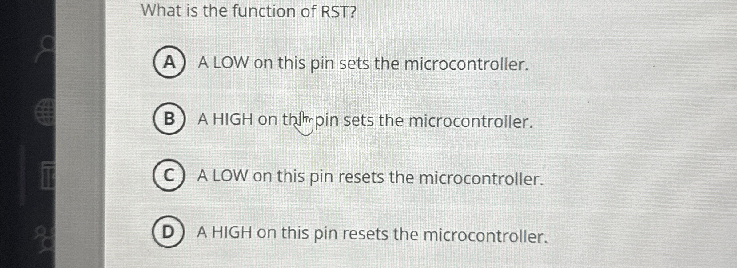 What is the function of RST ? A LOW on this pin