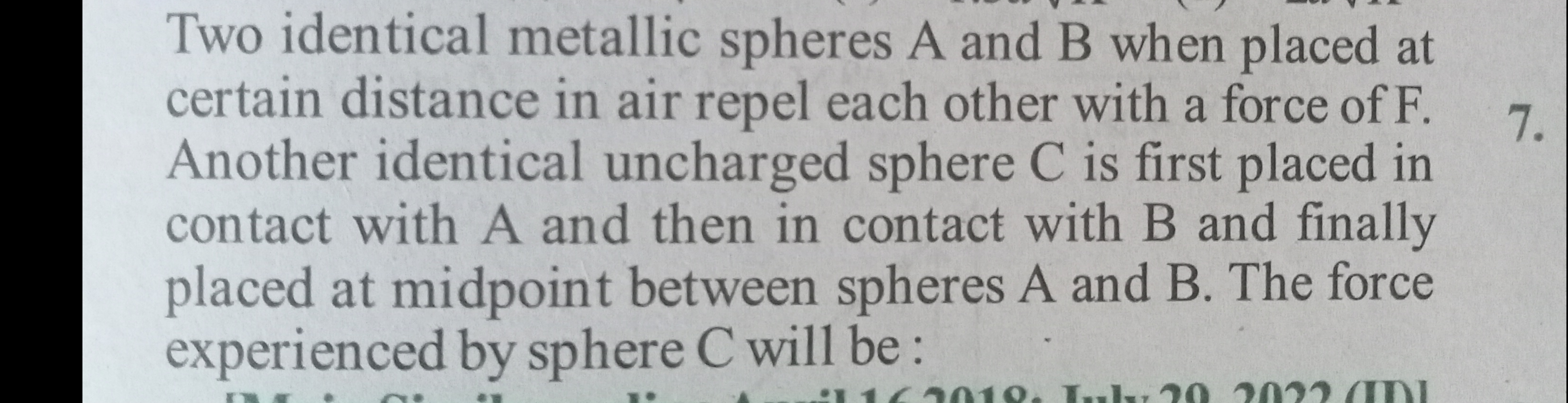 Two identical metallic spheres A and B when