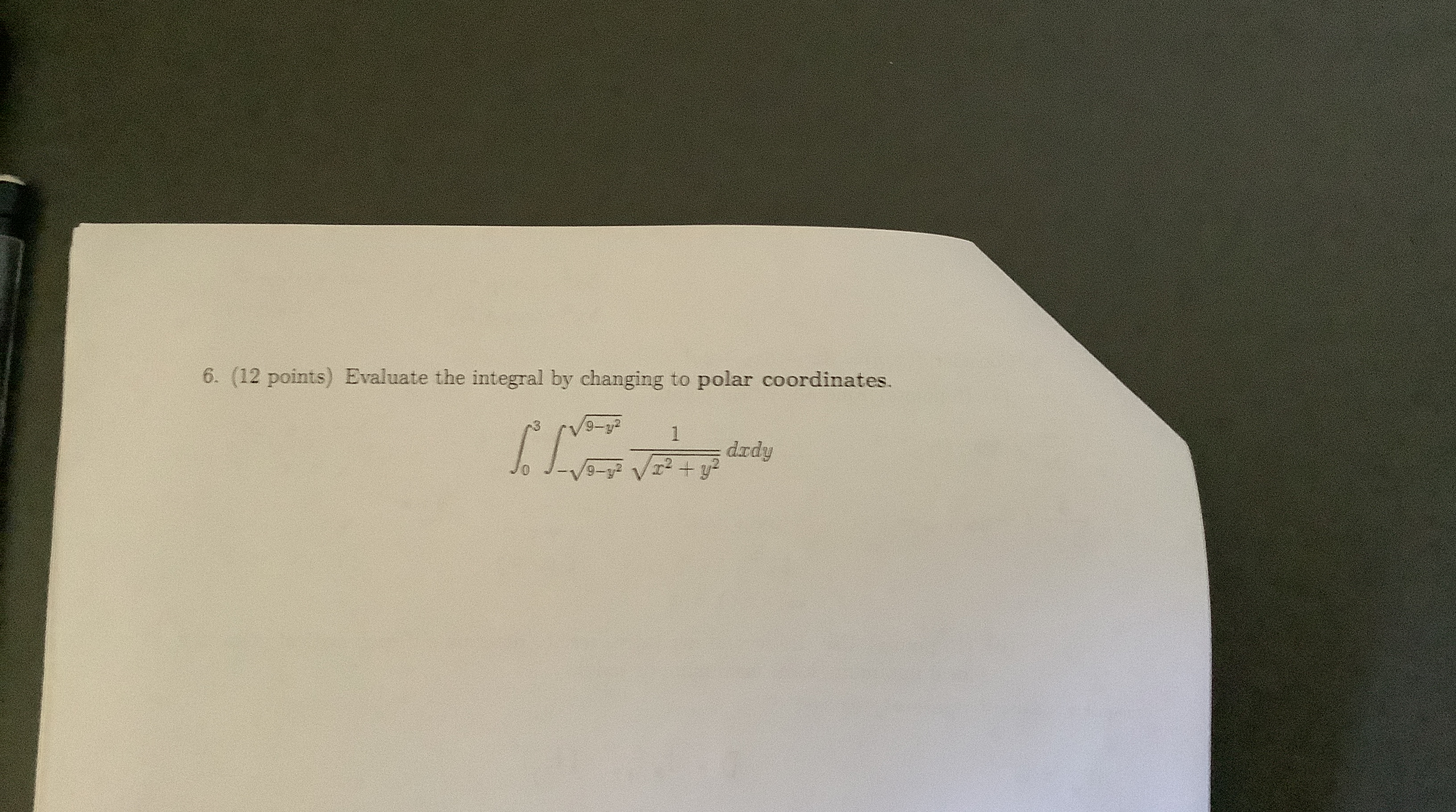 Evaluate the integral by changing to polar