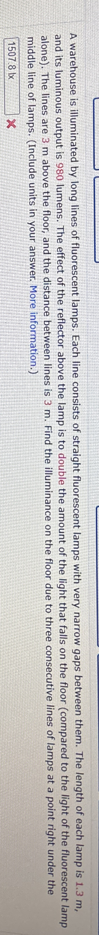 A warehouse is illuminated by long lines of