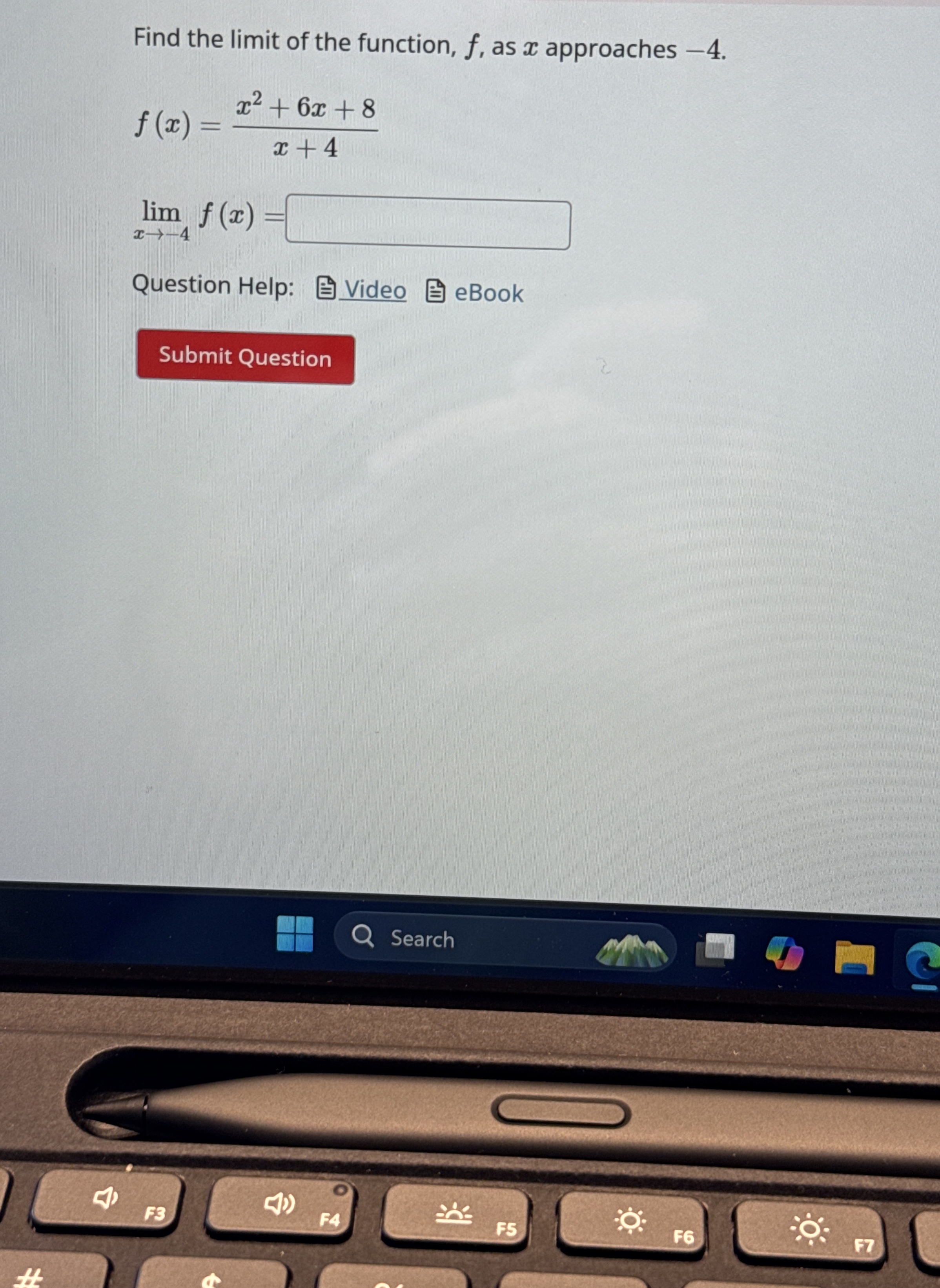 Find the limit of the function, f , as x
