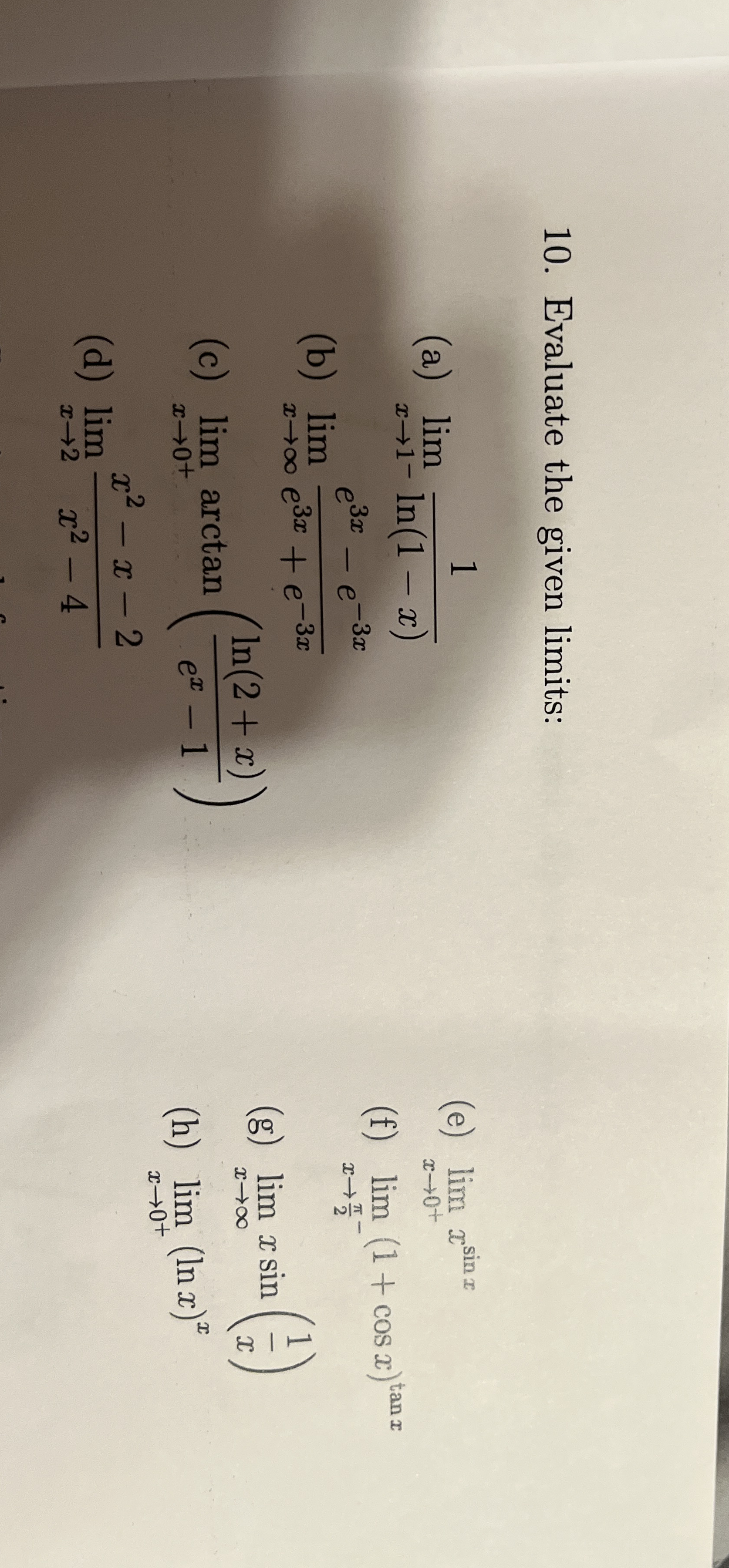 Evaluate the given limits: ( a ) lim x 1 - 1 l n
