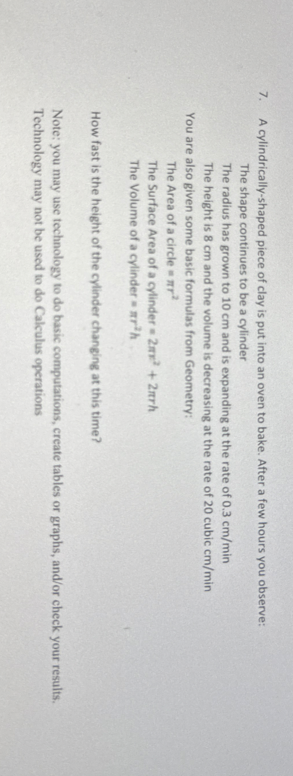 A cylindrically - shaped piece of clay is put