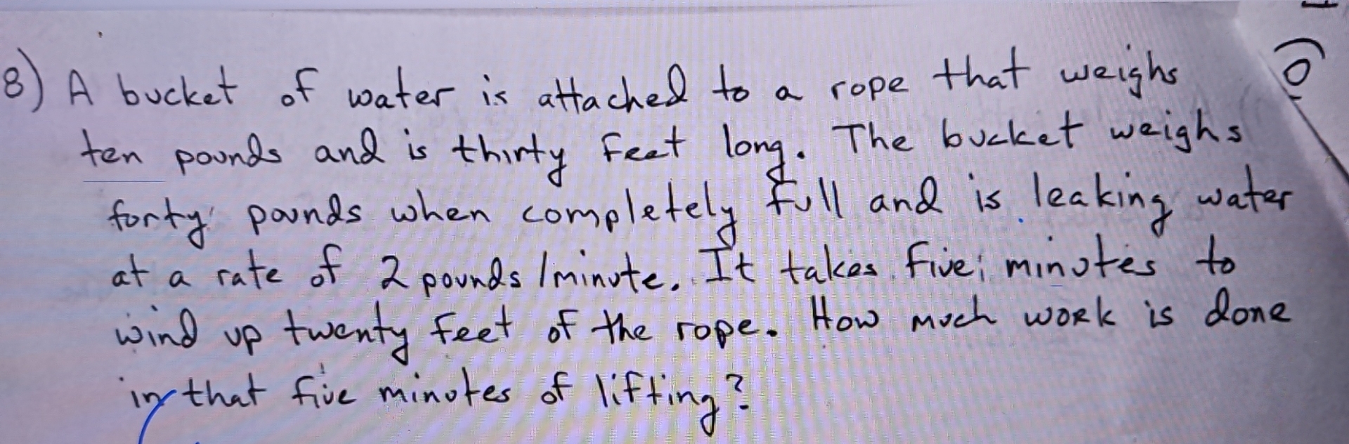 A bucket of water is attached to a rope that