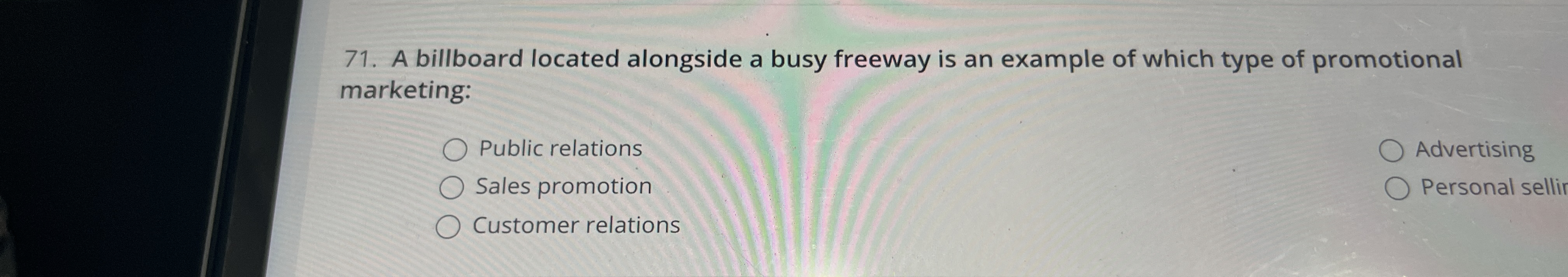 A billboard located alongside a busy freeway is