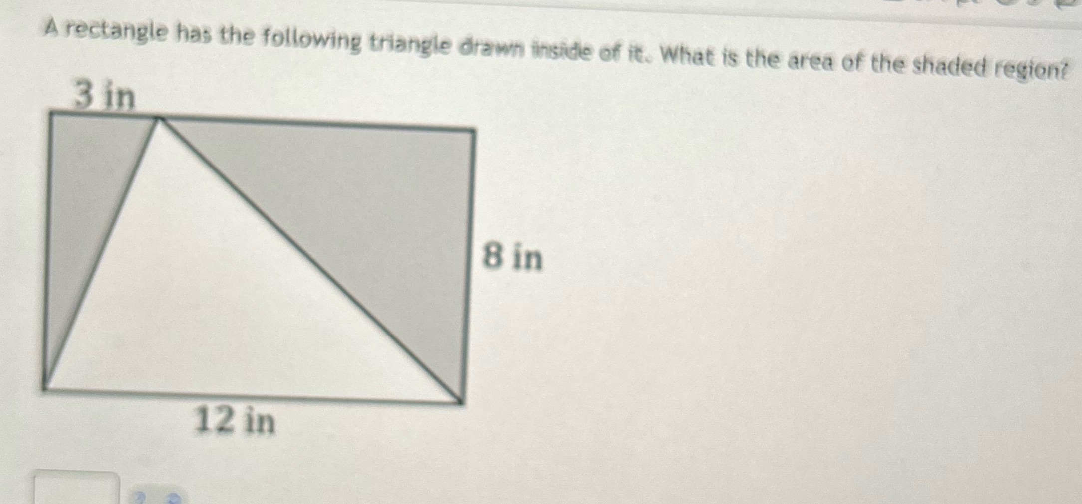 A rectangle has the following triangle drawn