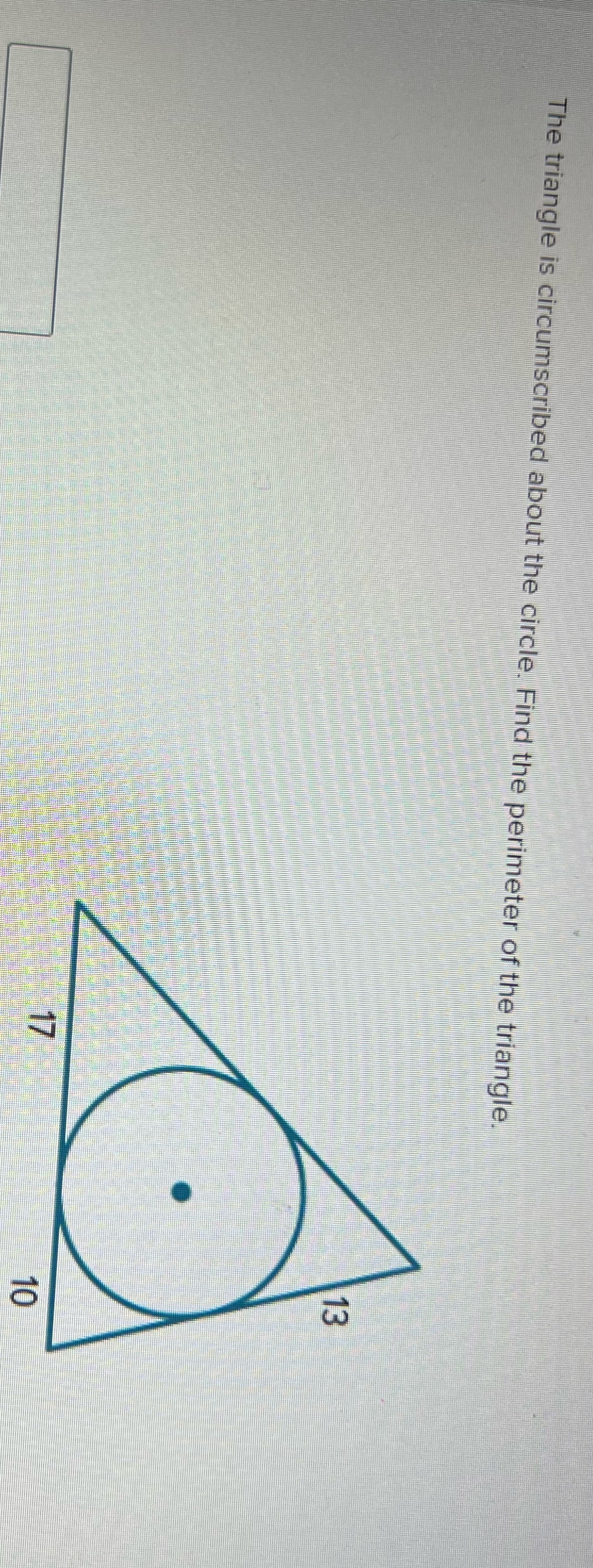 The triangle is circumscribed about the circle.