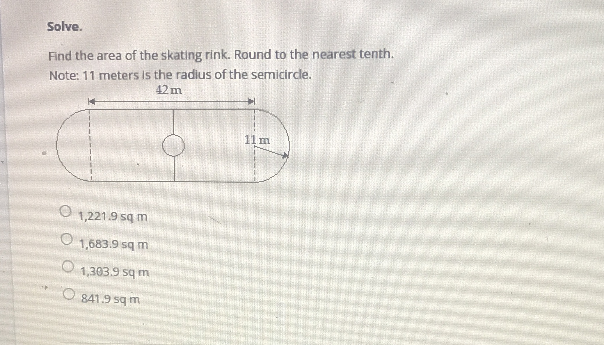 Solve. Find the area of the skating rink. Round