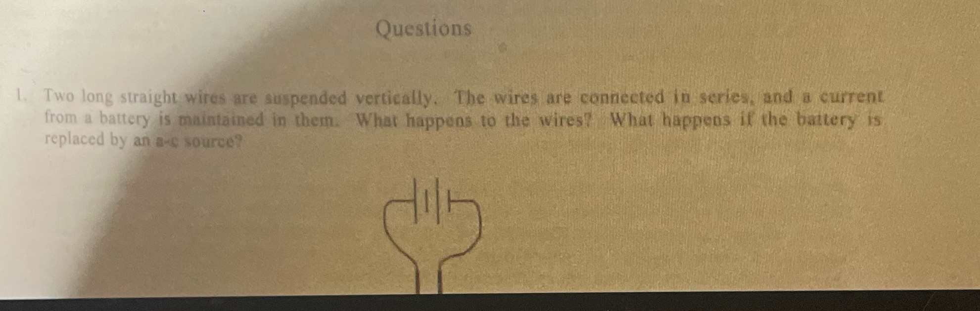Physics Questions 1. Two long straight wires are