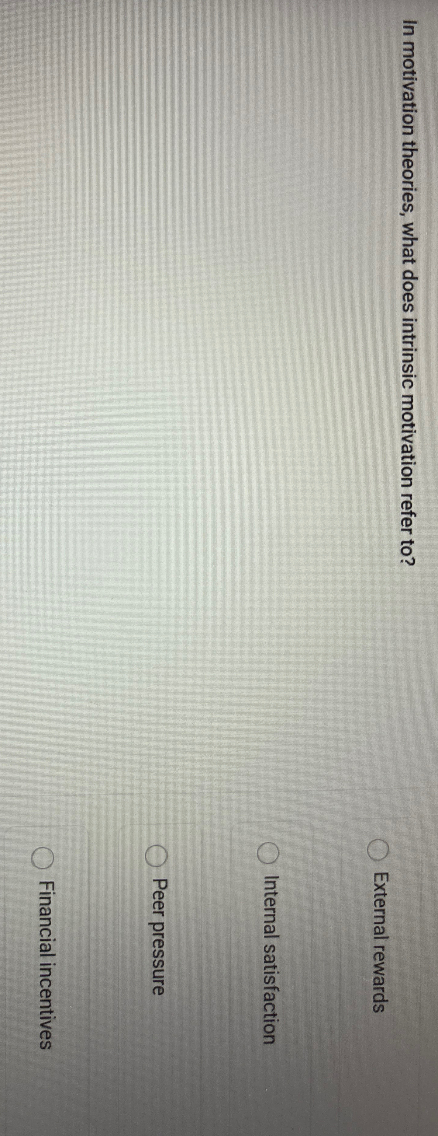 In motivation theories, what does intrinsic