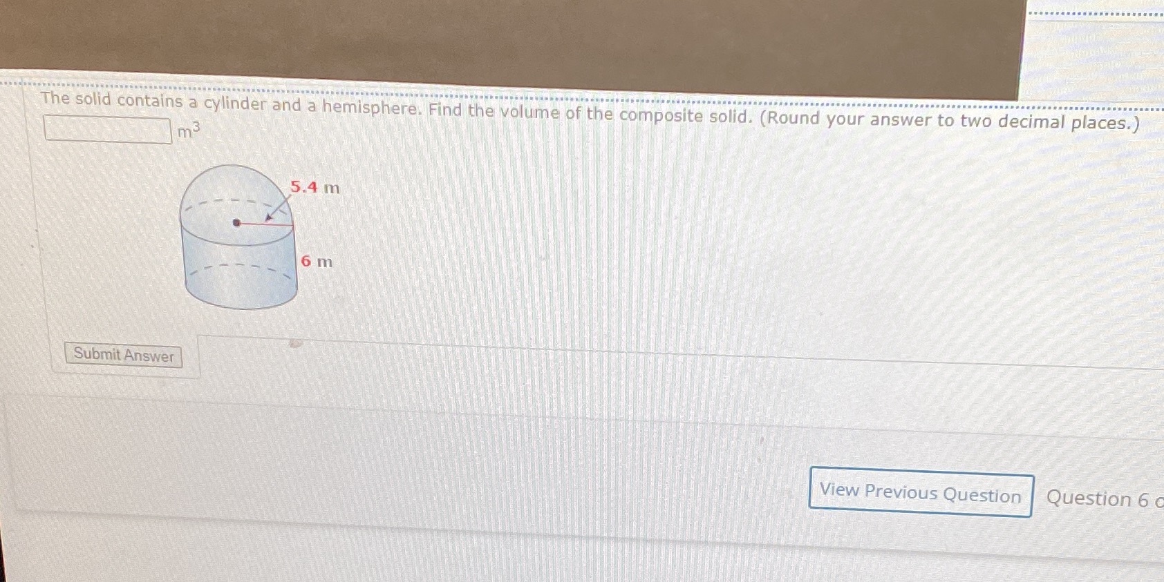 The solid contains a cylinder and a hemisphere.