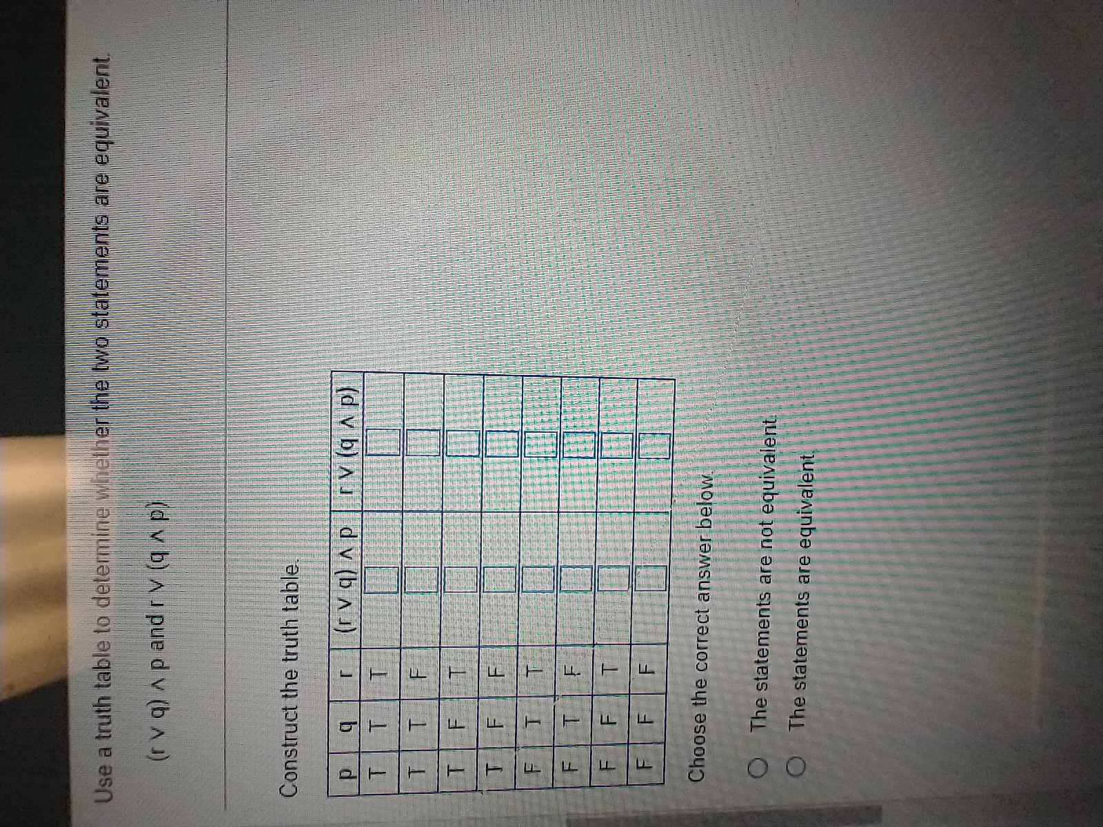 Use a truth table to determine whether the two