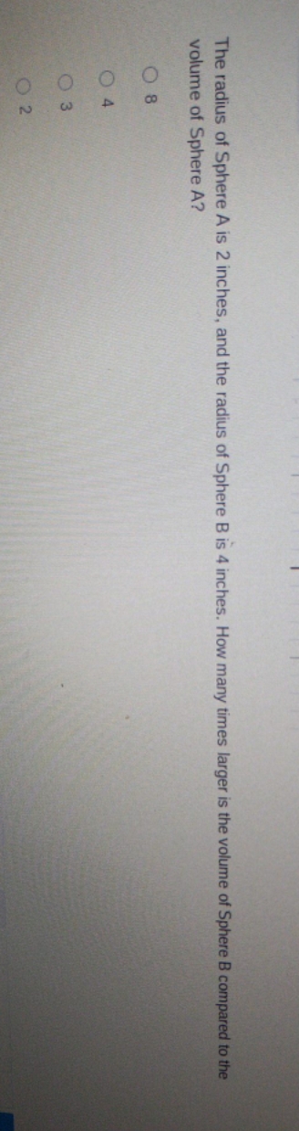 How many times larger is the volume of sphere B