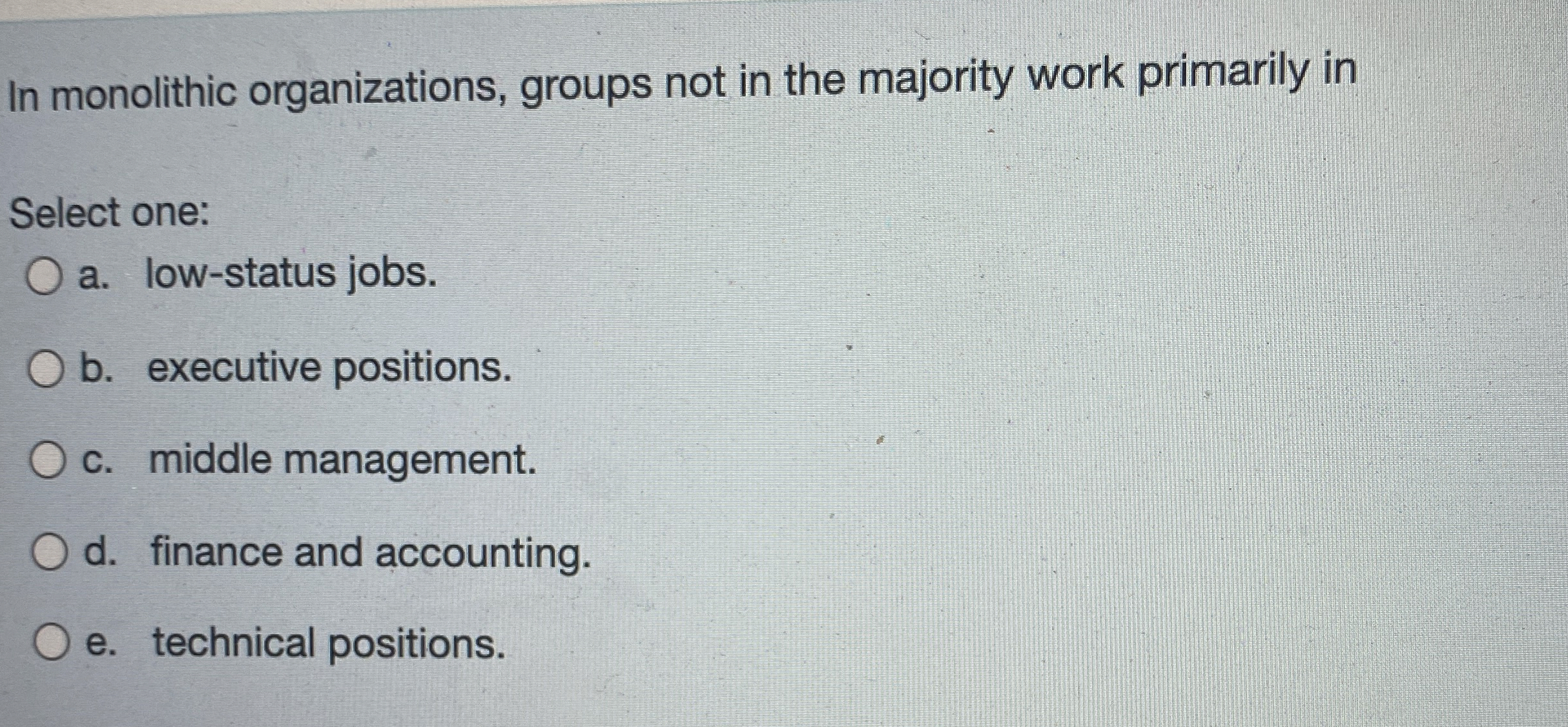 In monolithic organizations, groups not in the