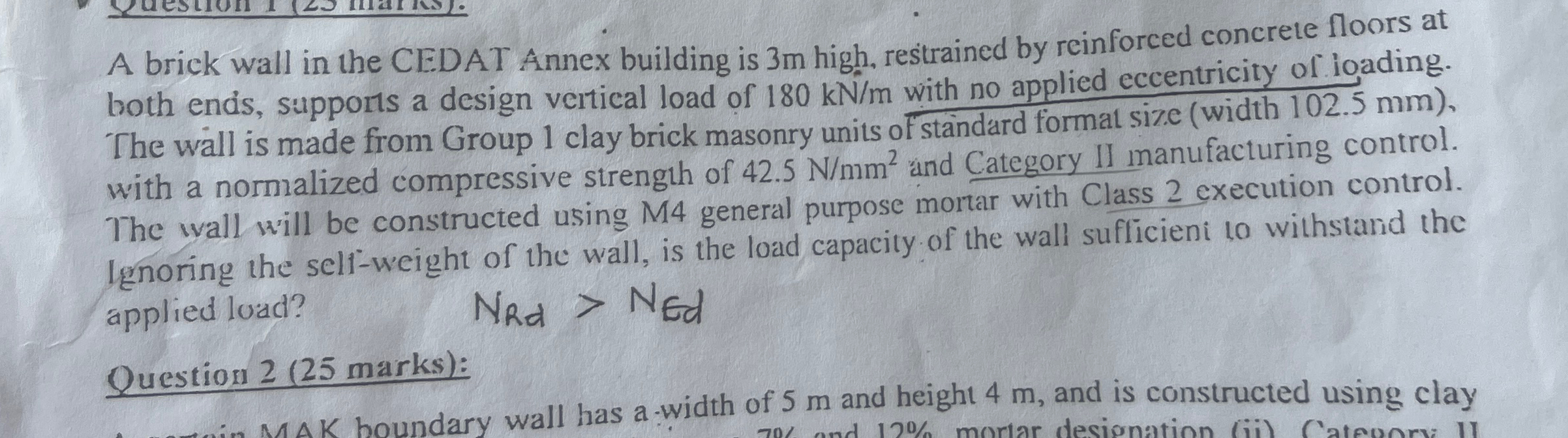 A brick wall in the CEDAT Annex building is 3 m
