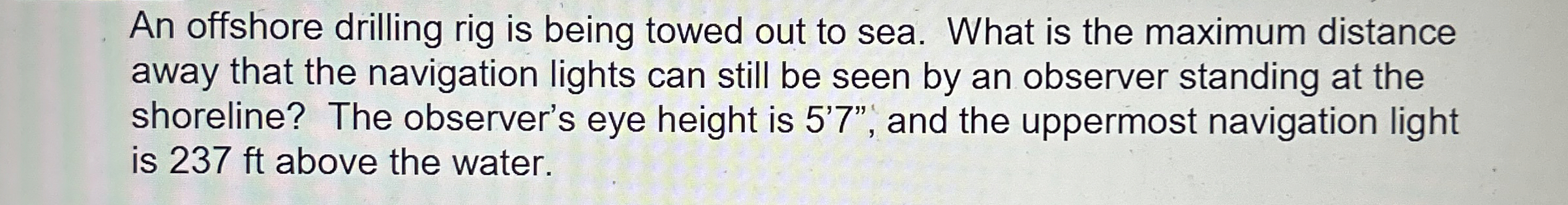 An offshore drilling rig is being towed out to