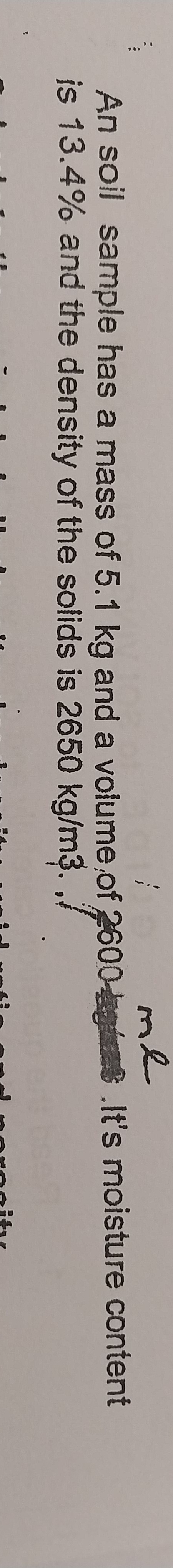 An soil sample has a mass of 5 . 1 kg and a