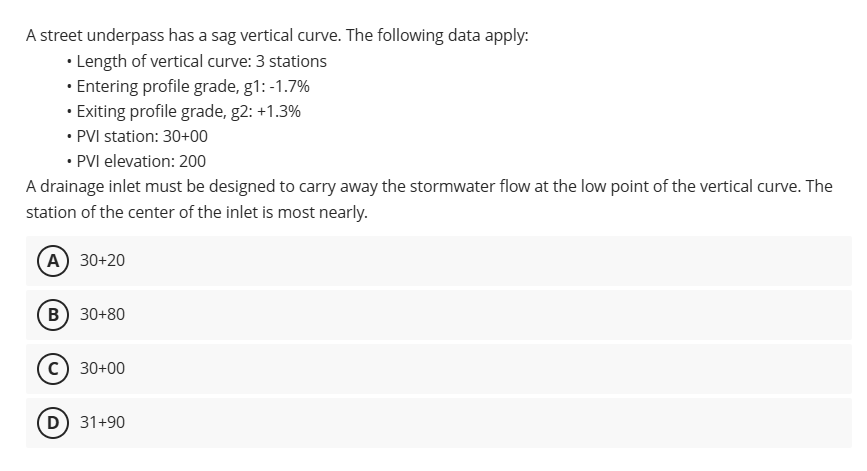 A street underpass has a sag vertical curve. The