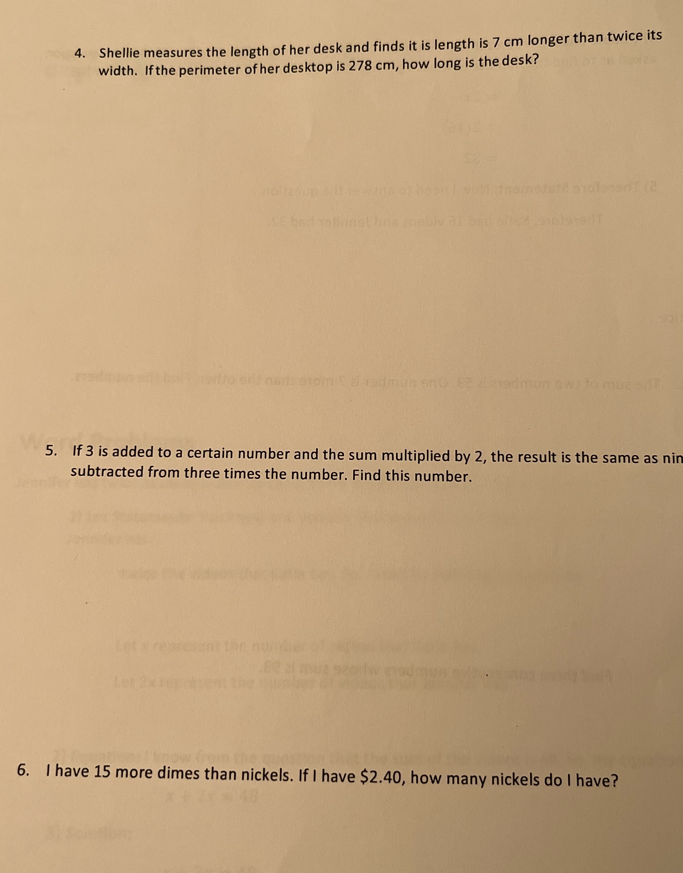 Shellie measures the length of her desk and finds