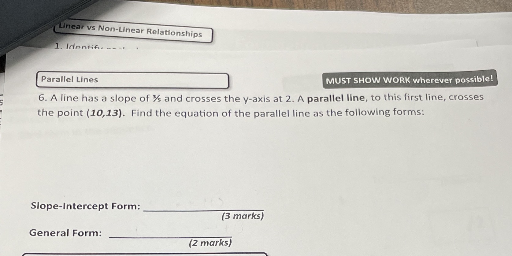 6. A line has a slope of ? and crosses the y-axis