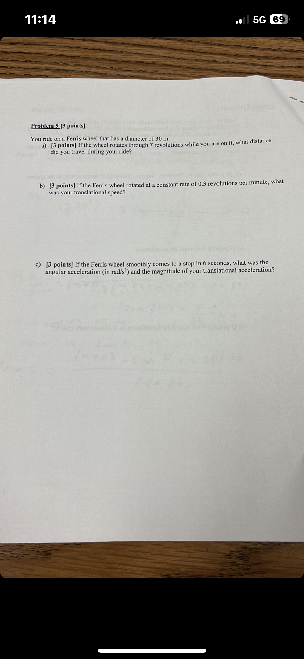 Problem 9 [9 points] You ride on a Ferris wheel