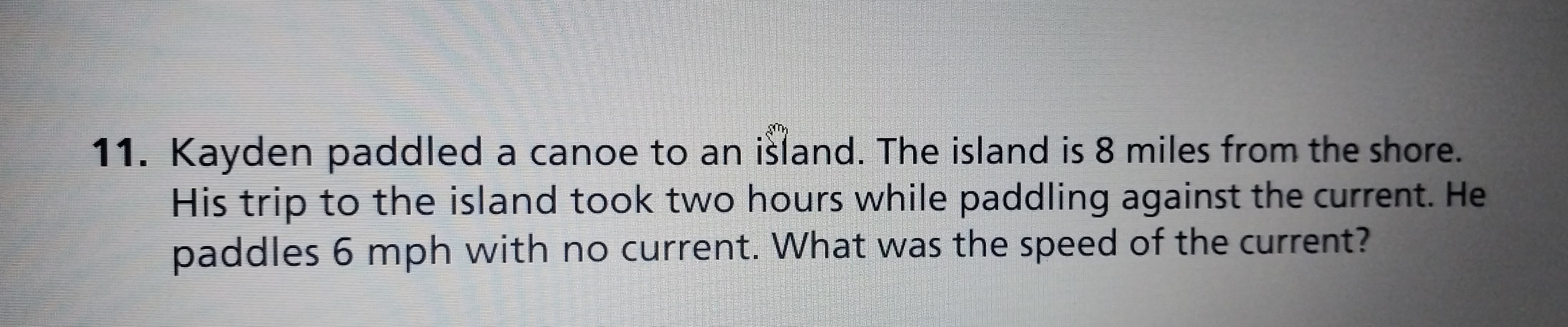 \f11. Kayden paddled a canoe to an island. The