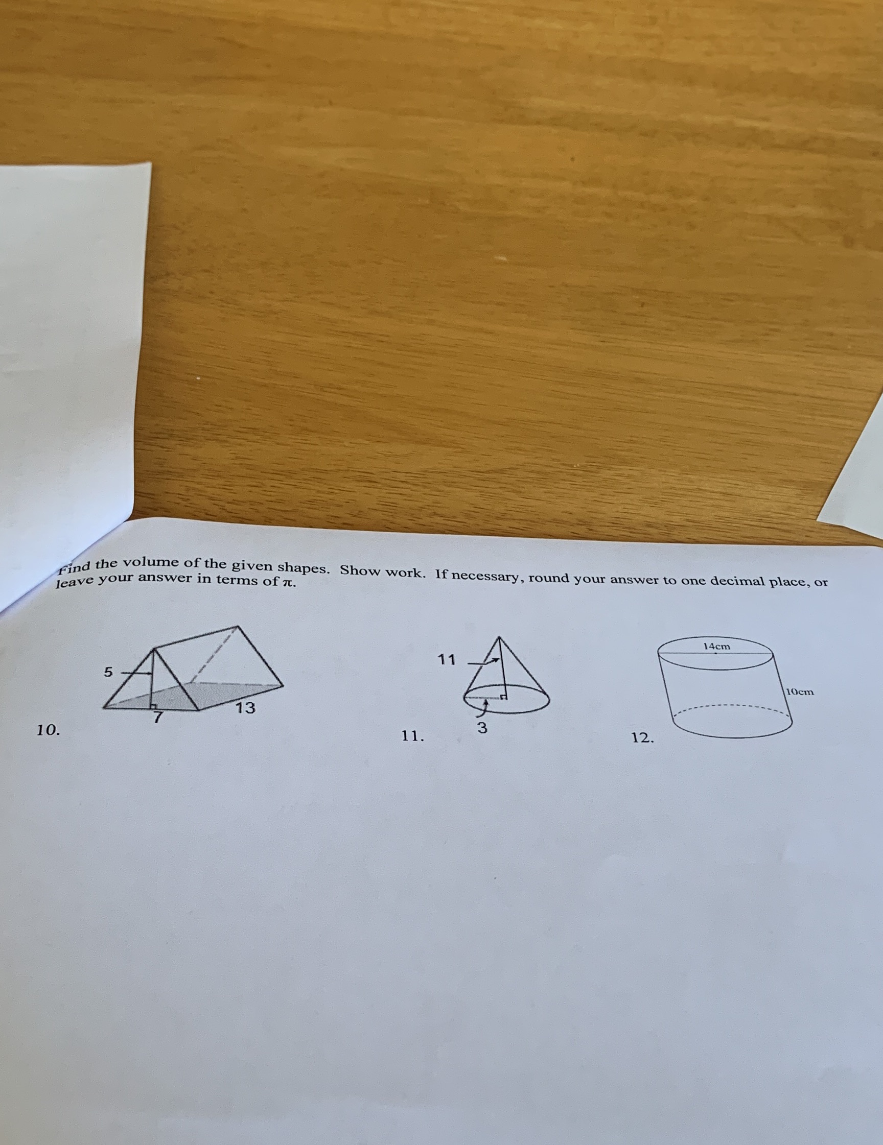 find the volume of the given shapes. Show work.