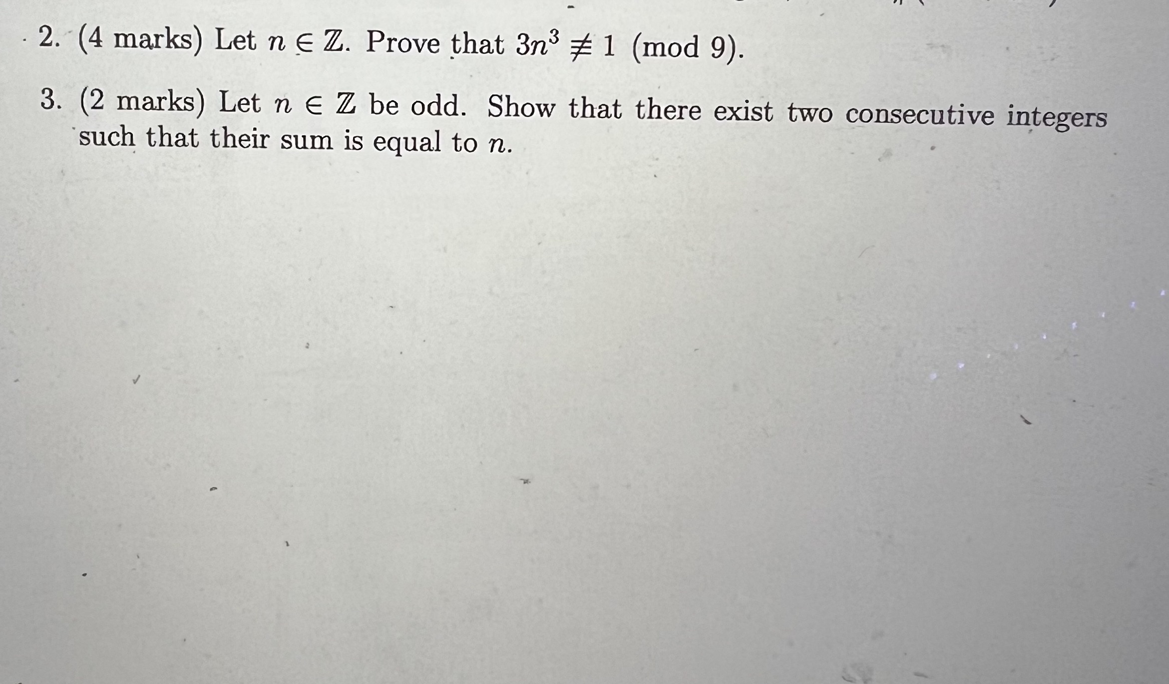 2. (4 marks) Let n E Z. Prove that 3n3 # 1 (mod