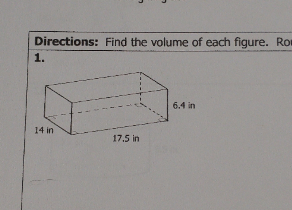 find the volume of each figure. Round to the