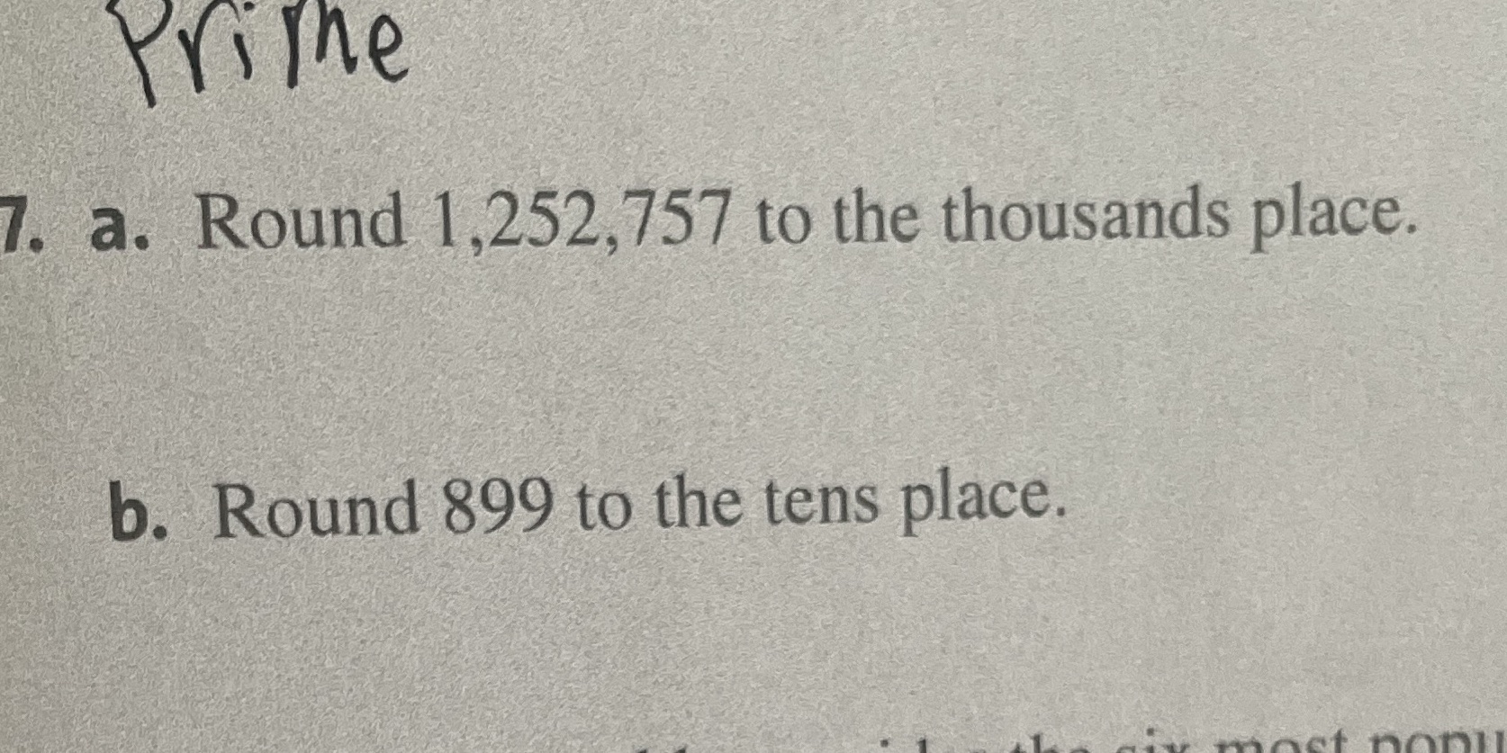 PriThe 7. a. Round 1,252,757 to the thousands