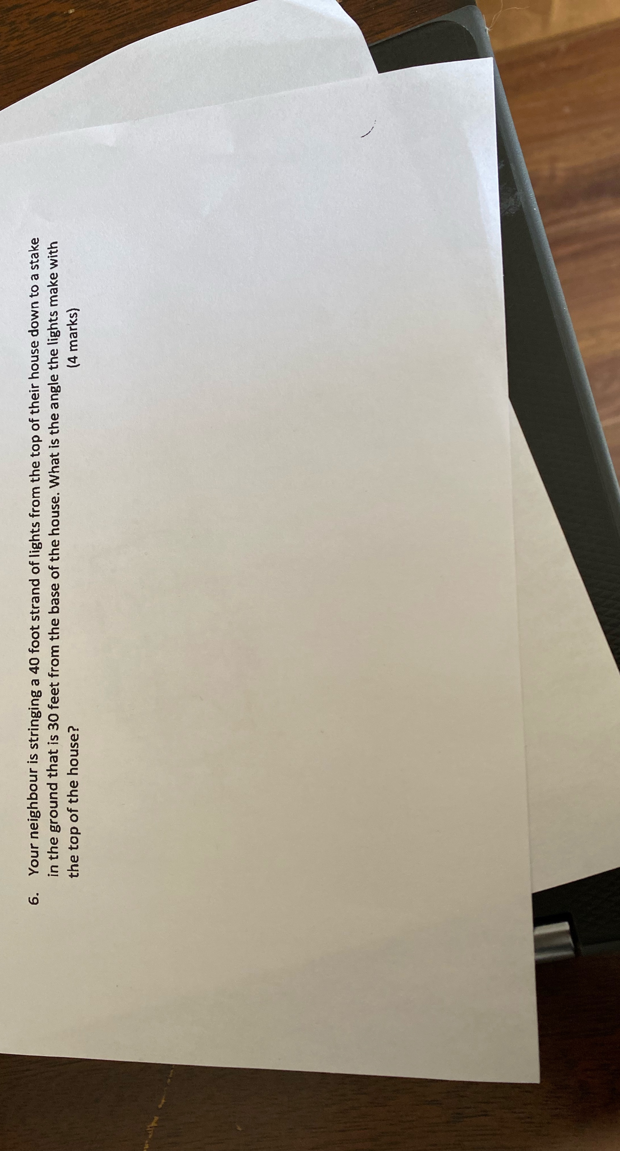 6. Your neighbour is stringing a 40 foot strand