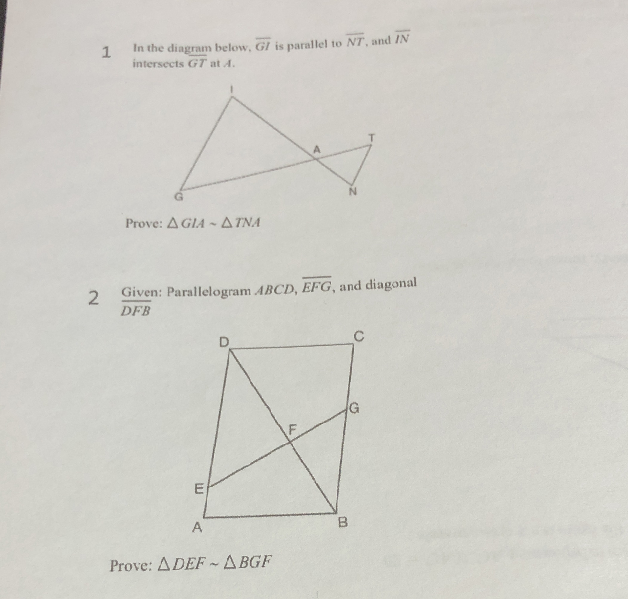 1 In the diagram below, G/ is parallel to NT, and