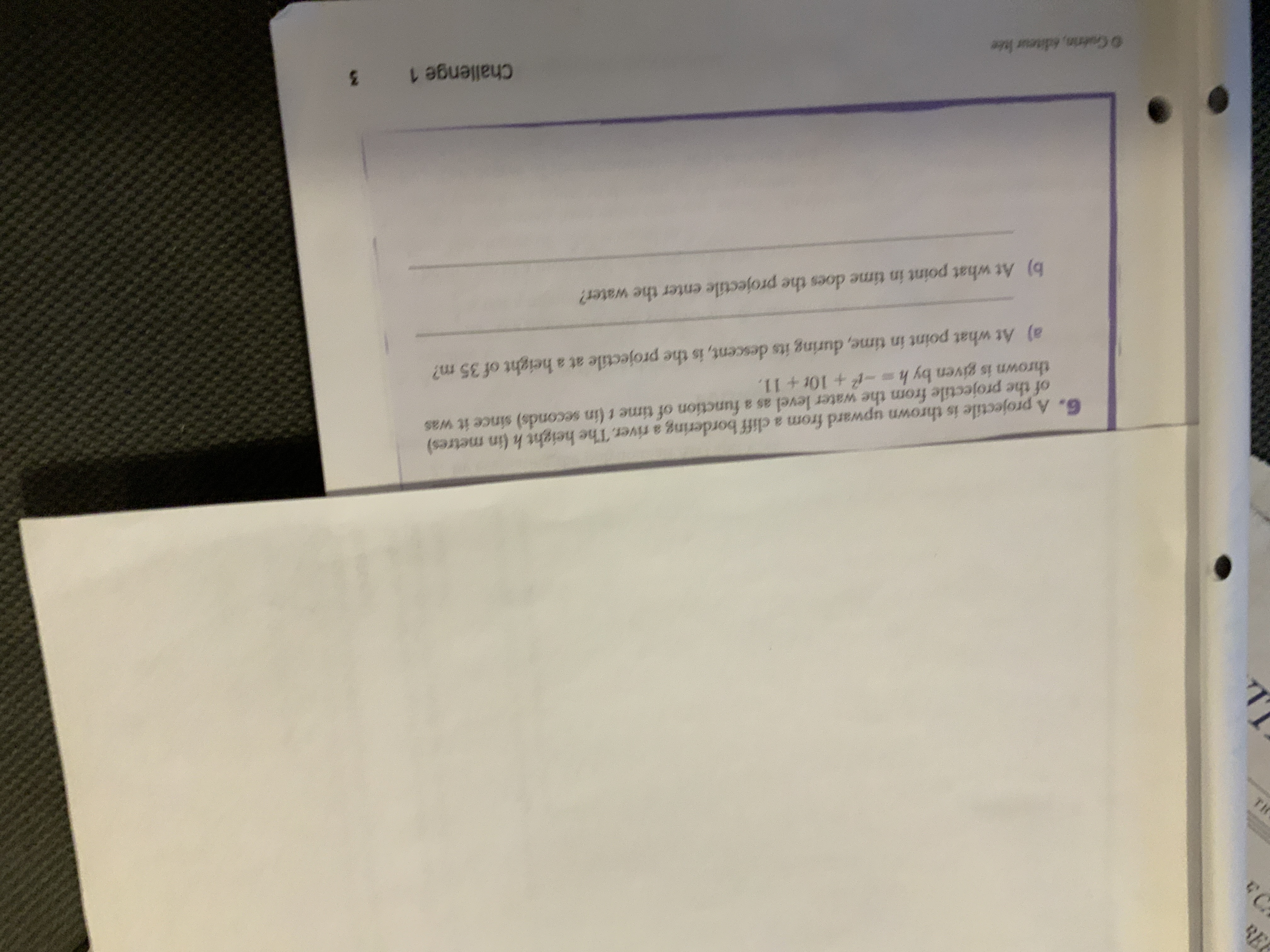 G. A projectile is thrown upward from a cliff