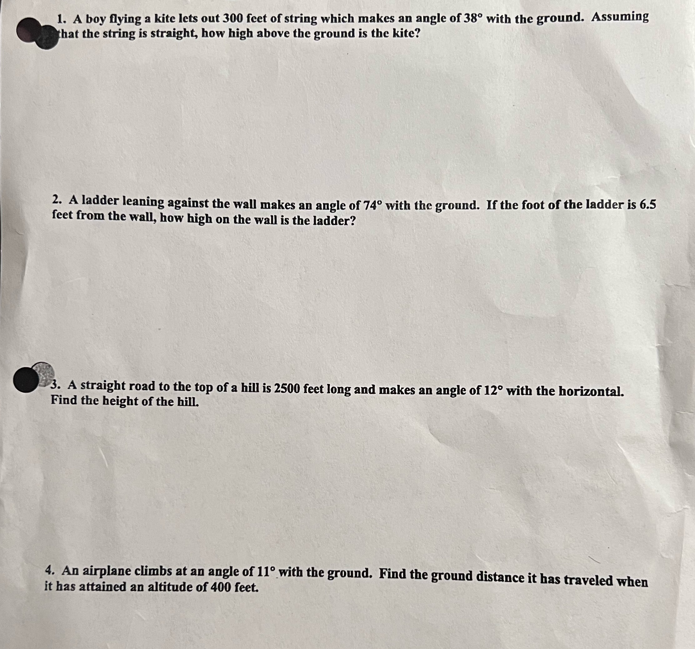 1. A boy flying a kite lets out 300 feet of