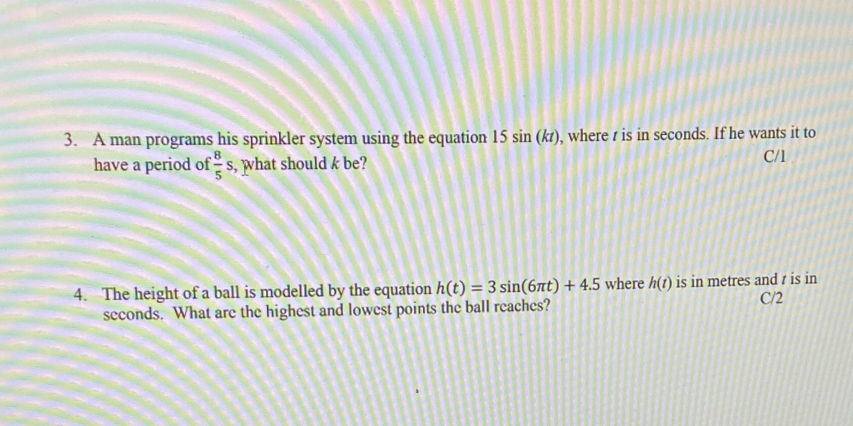 3. A man programs his sprinkler system using the