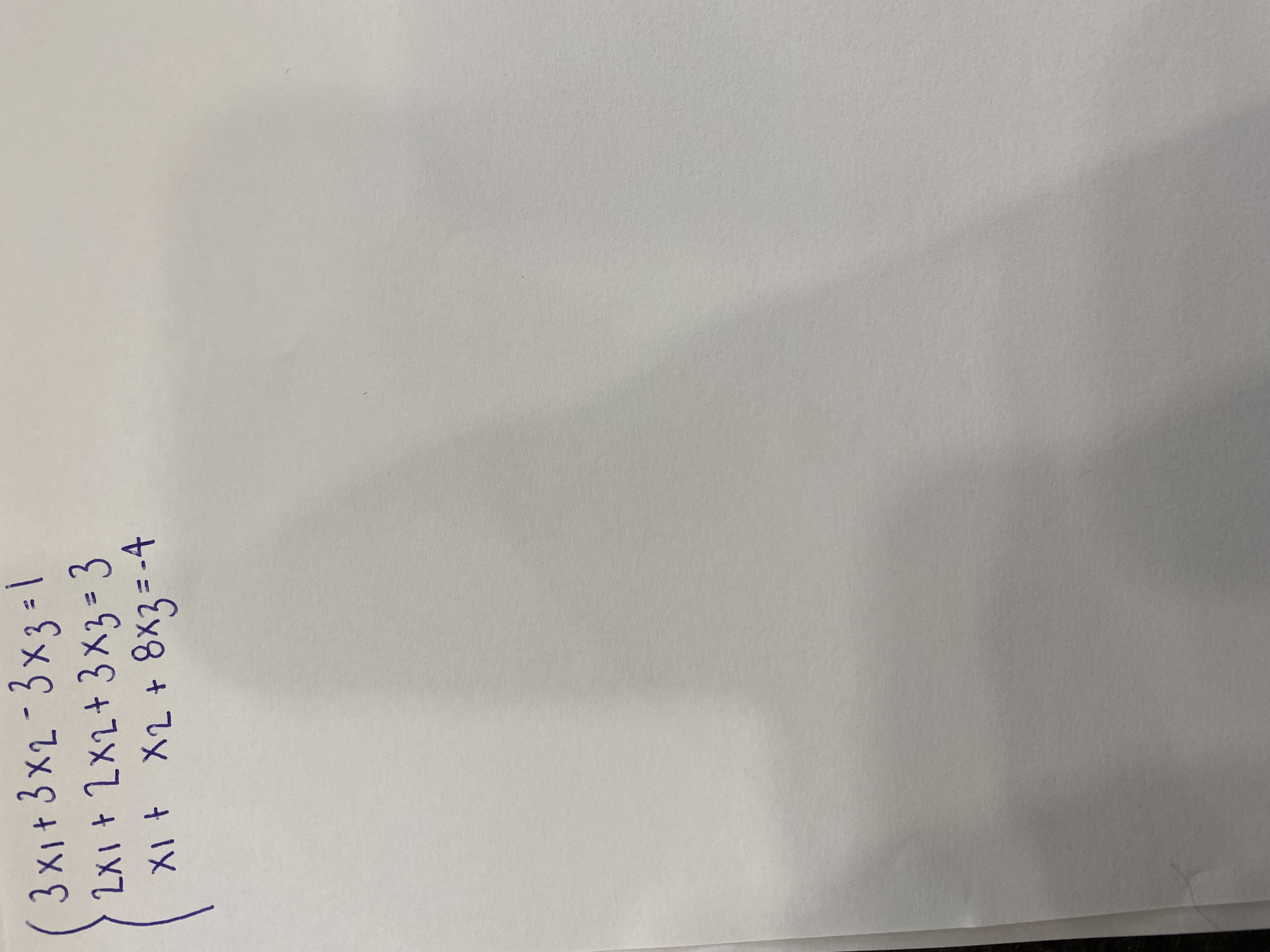 Solve the system of linear equations by modifying