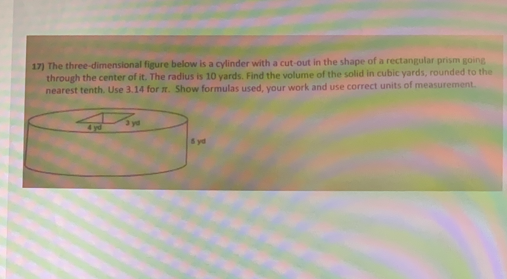 17) The three-dimensional figure below is a