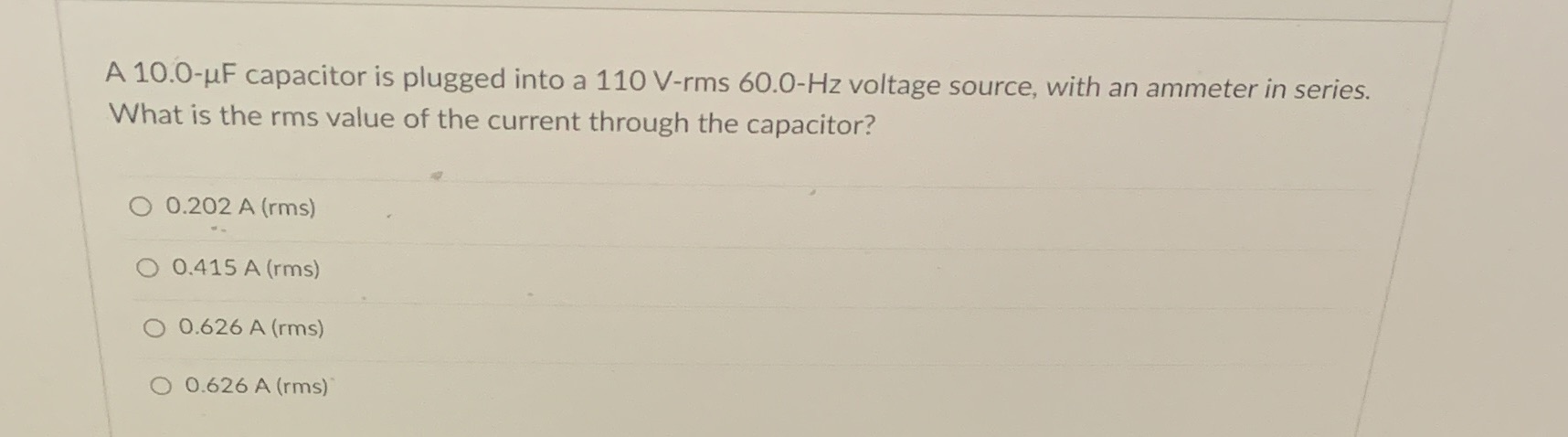 2 A 10.0-MF capacitor is plugged into a 110 V-rms