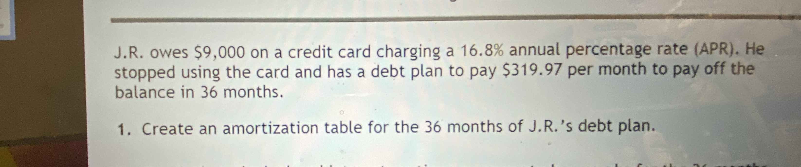 J.R. owes $9,000 on a credit card charging a