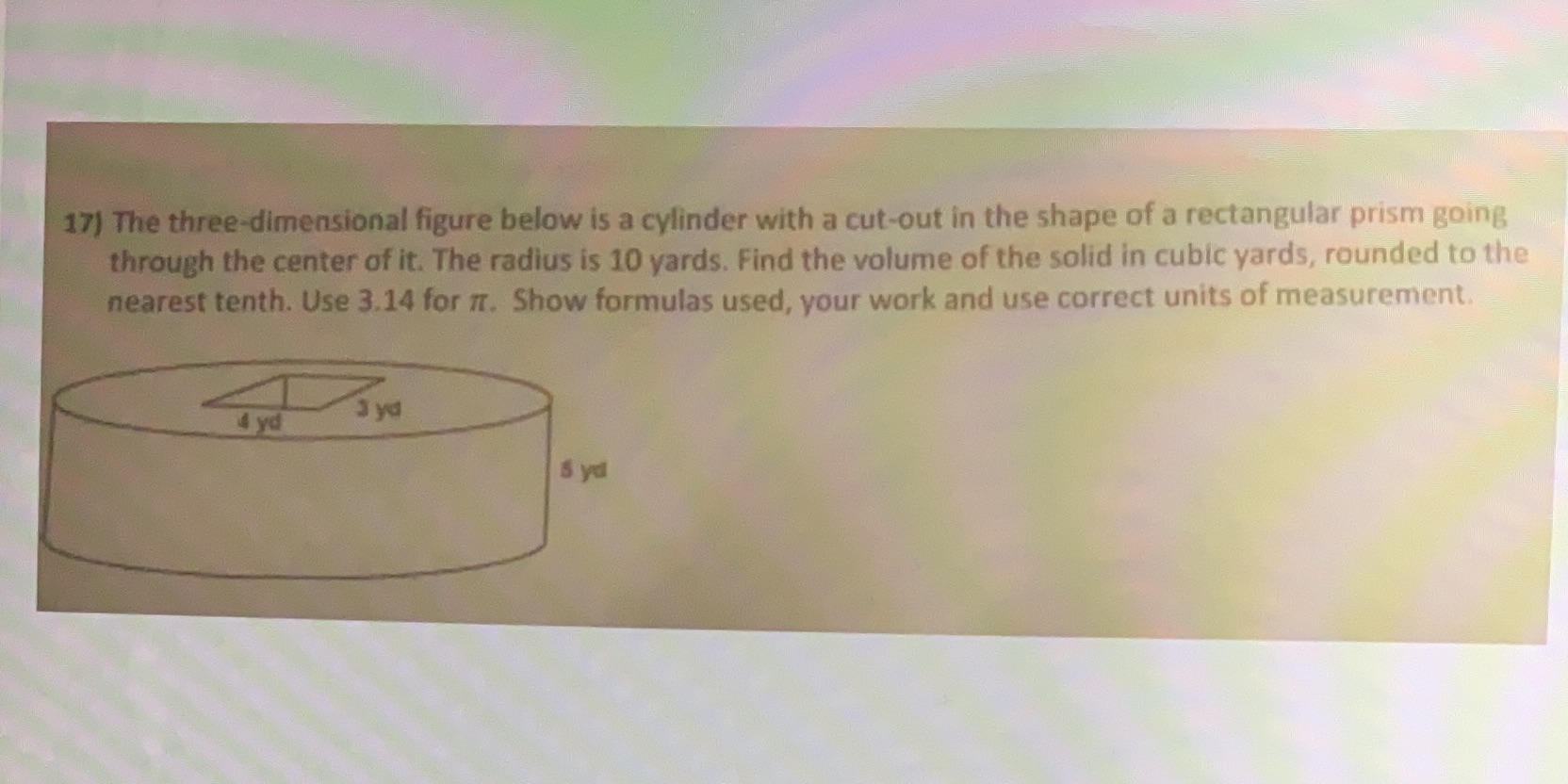 17) The three-dimensional figure below is a