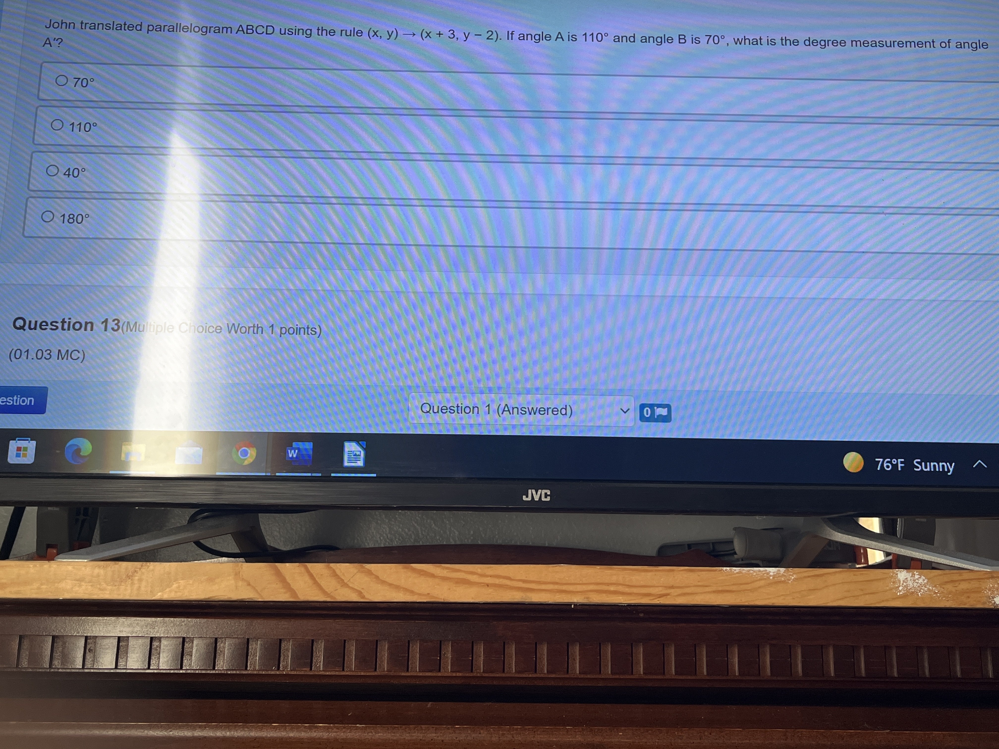 John translated parallelogram ABCD using the rule