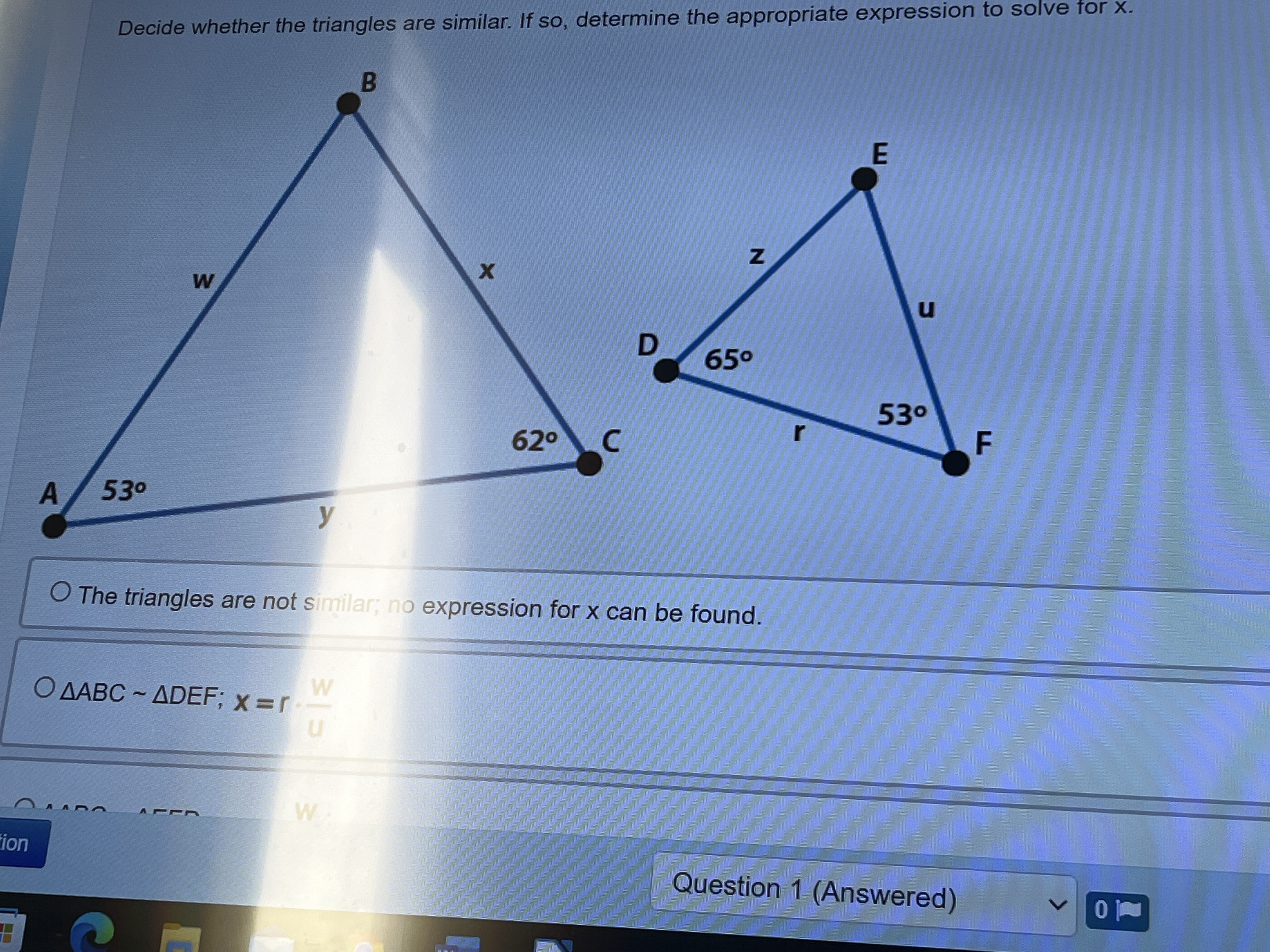 Decide whether the triangles are similar. If so,