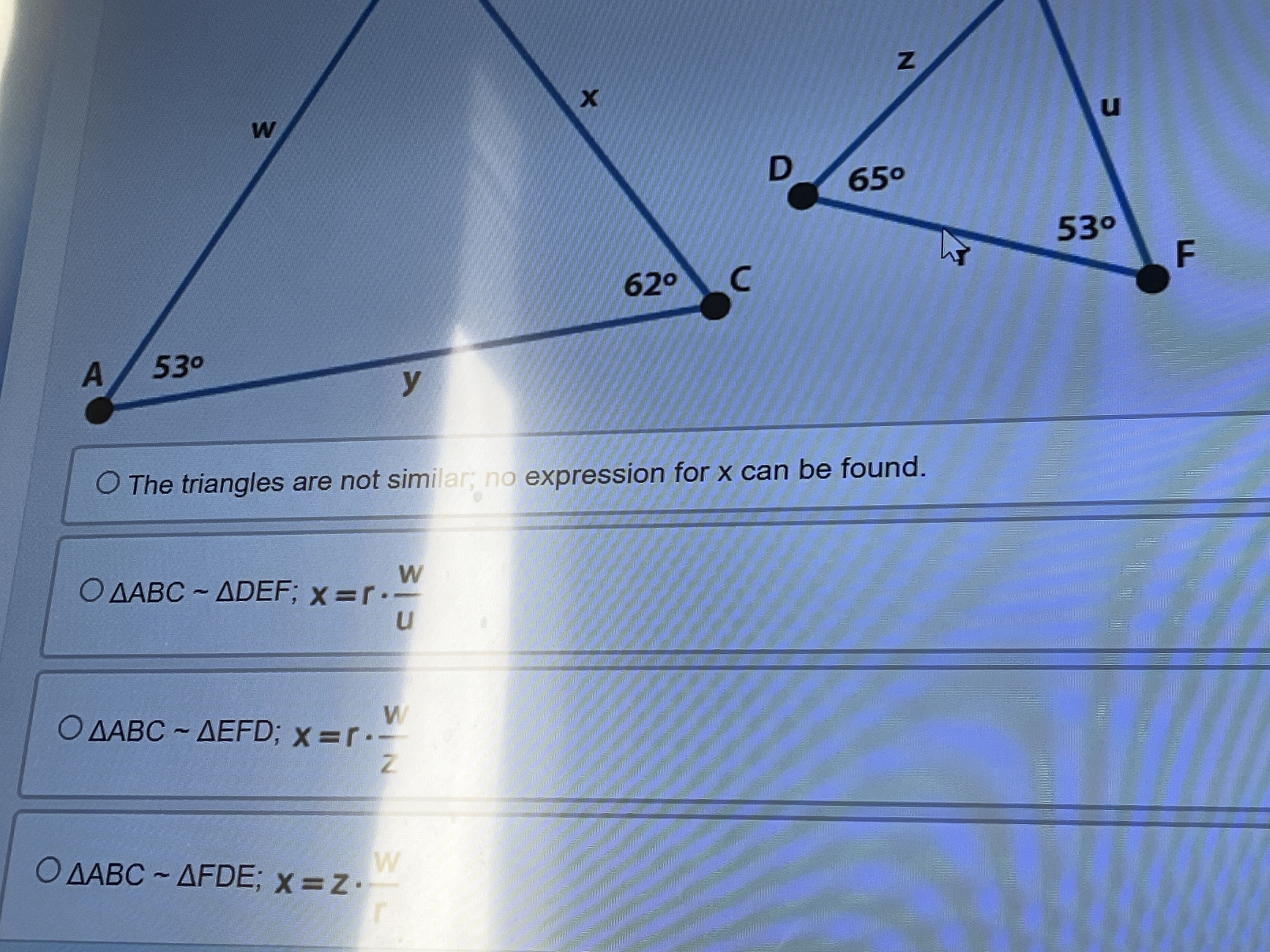 Decide whether the triangles are similar. If so,
