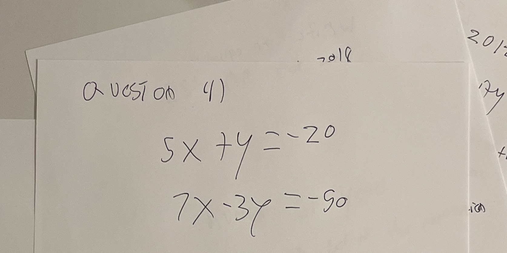 It's a system of equations what's the awnser ? \f