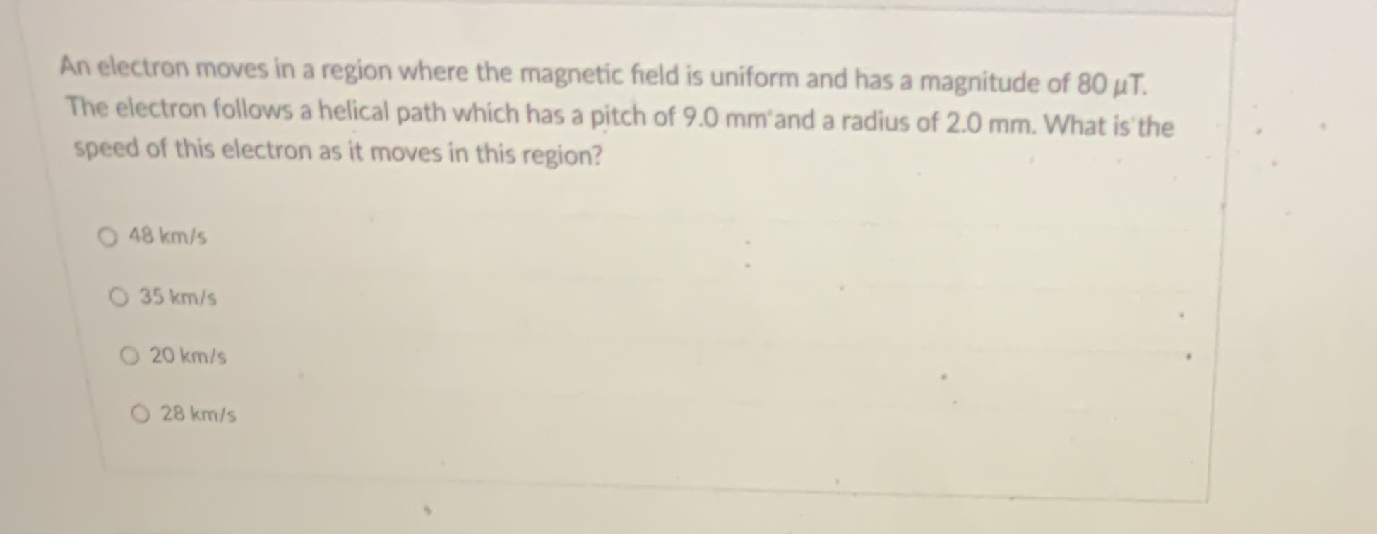 14 An electron moves in a region where the