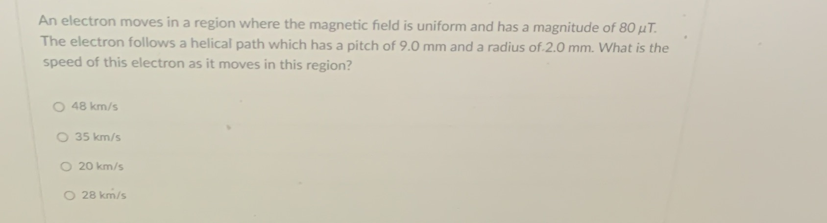 14 An electron moves in a region where the