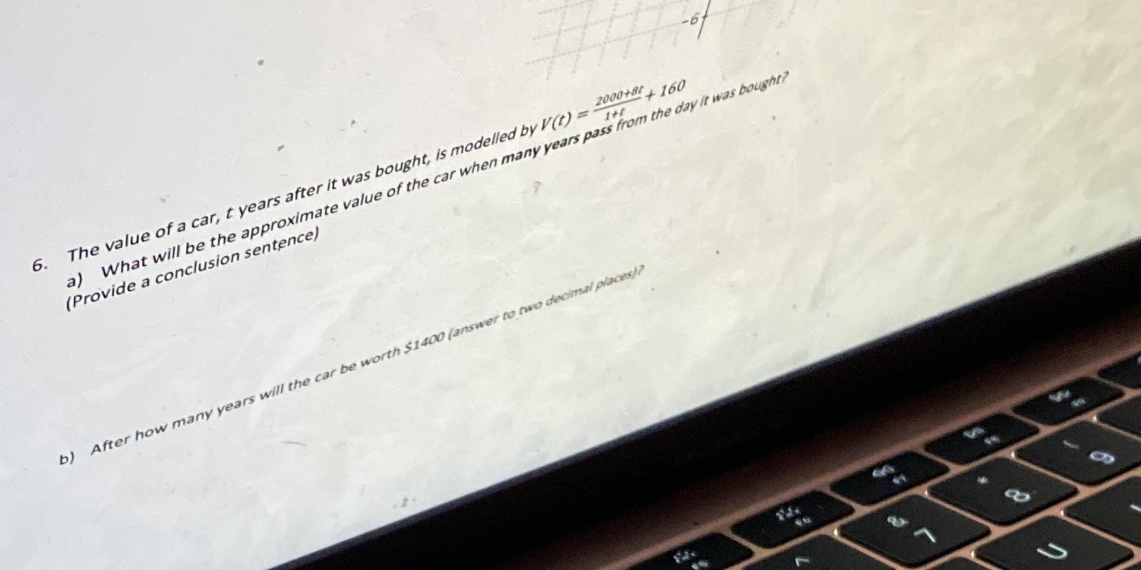6. The value of a car, t years after it was